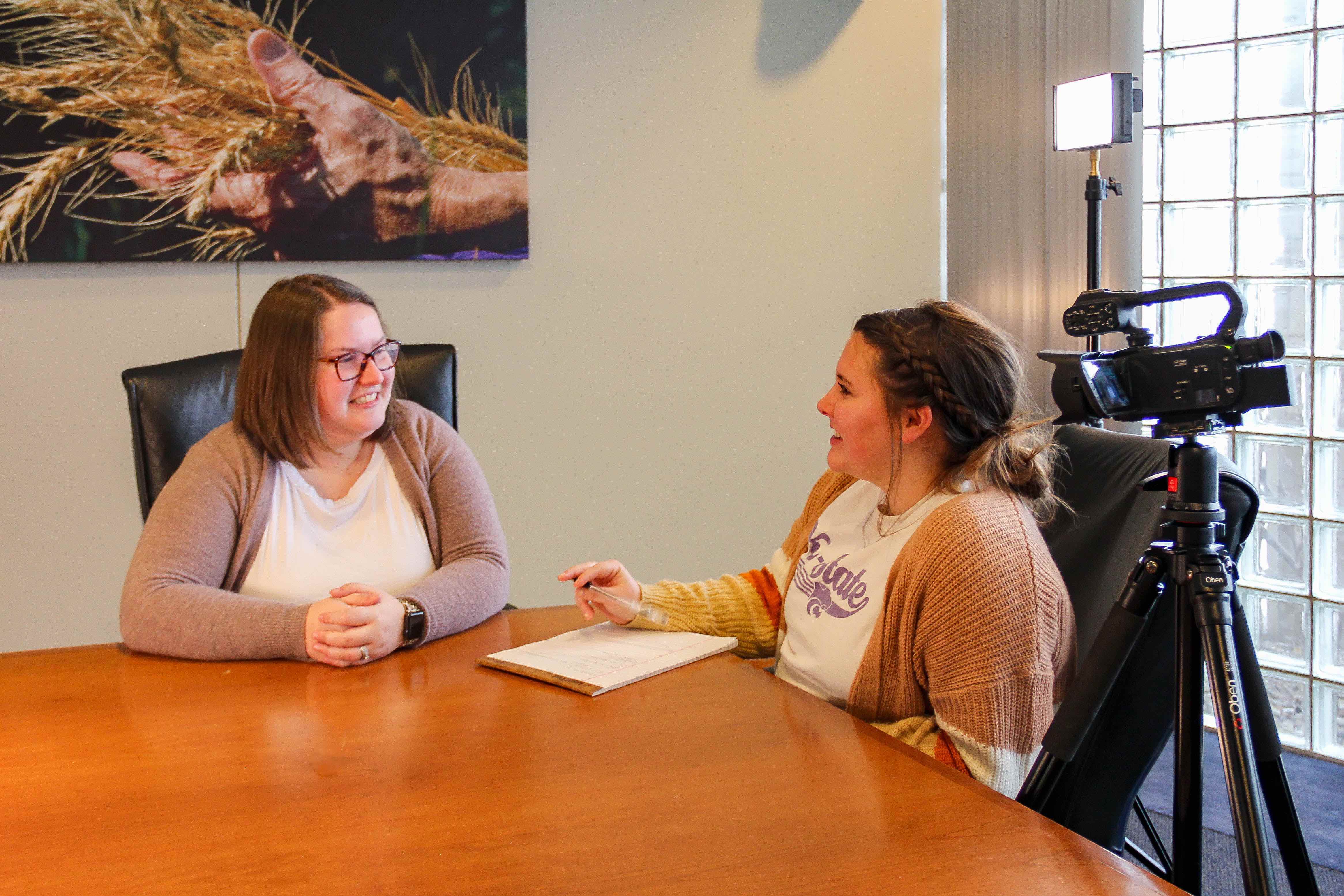 Photo of two students interviewing